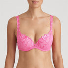 Pink padded bra with a rounded shape, elegant floral embroidery, and retro raised tulle dots.