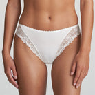 Playful and feminine ivory bikini brief with lace embroidery.
