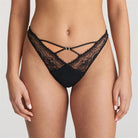 This stunning black thong made from Italian lace with a snakeskin print will add a seductive touch to your lingerie set.