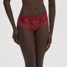 Stunning lipstick red shorty in guipure embroidery and knitted fabric by Simone Perele.