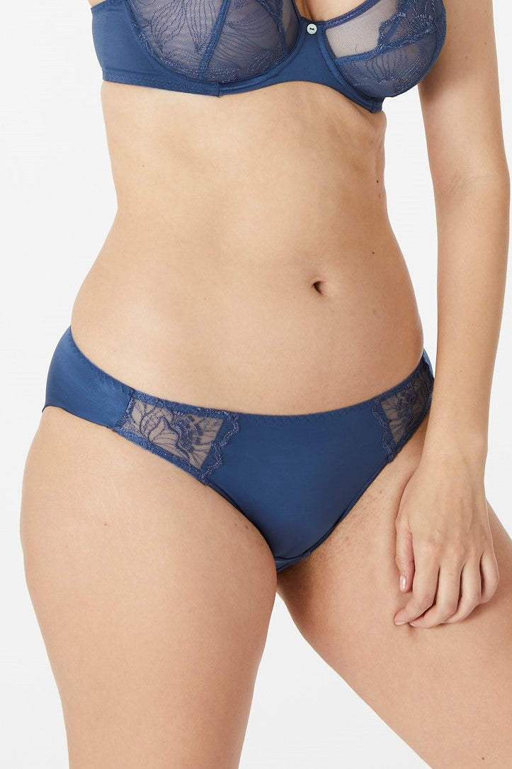 Blue bikini briefs with back and front in opaque mesh and sides in floral embroidery.