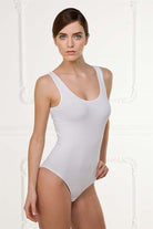 White singlet bodysuit with wide straps; Smooth & soft fabric making it a comfortable wear