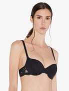 Constructed softly padded cups for shaping and support, this black bra is crafted from stretch cotton for a beautifully soft feel against the skin and features a trim of Leavers lace.