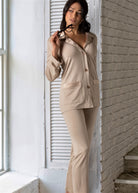 Premium viscose pyjama set featuring beautiful satin on the lapel, pockets and cuffs. Button opening runs all the way down the front of the garment for ease of movement and the PJ pant has a comfortable elastic waist band.