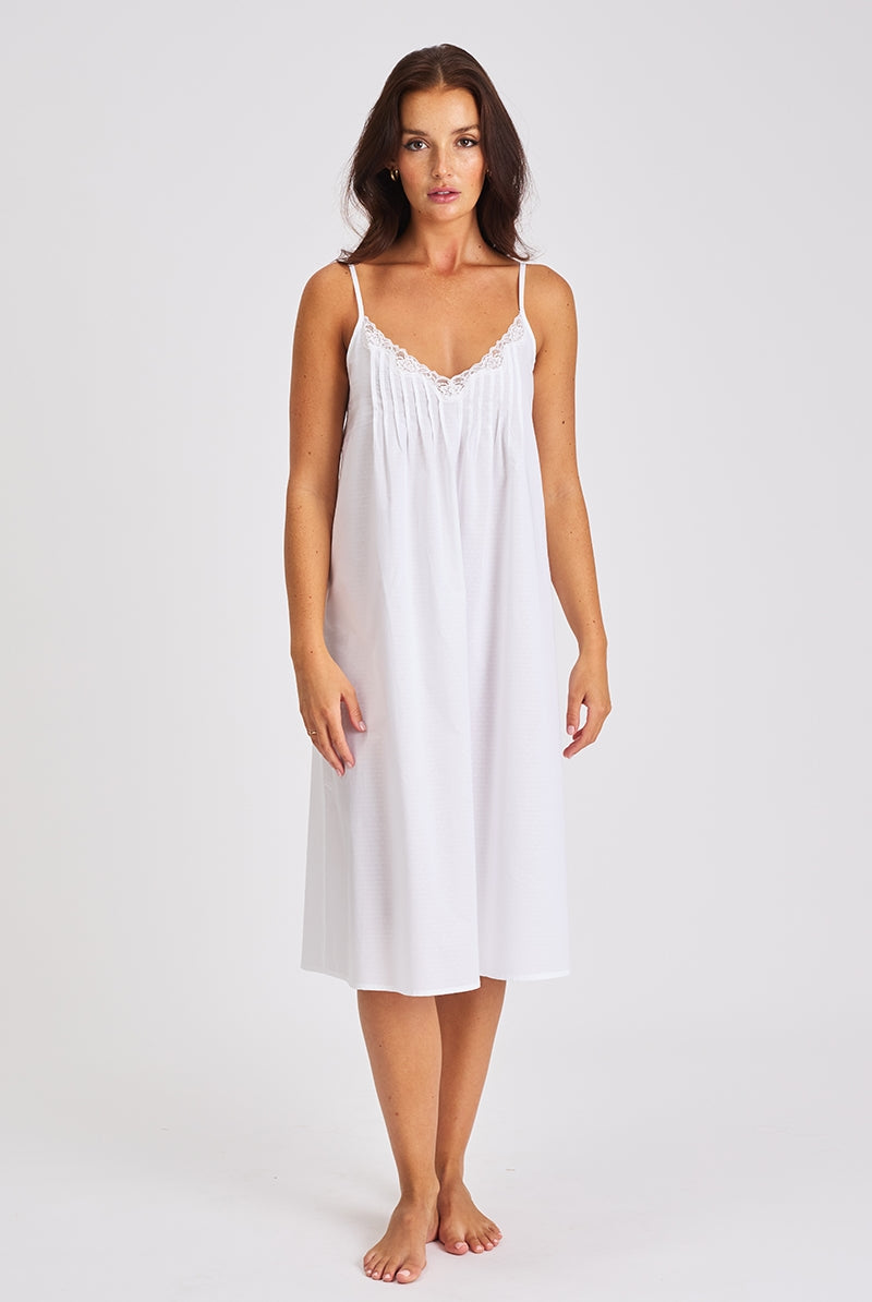 Superbly soft and pretty white self spot cotton nightdress. Lightweight and breathable to keep you cool and comfortable.