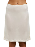 Ivory silk jersey half slip that sits above the knees and is light and seamless and soft around the waist.
