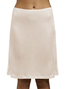 Blush silk jersey half slip that sits above the knees and is light and seamless and soft around the waist.