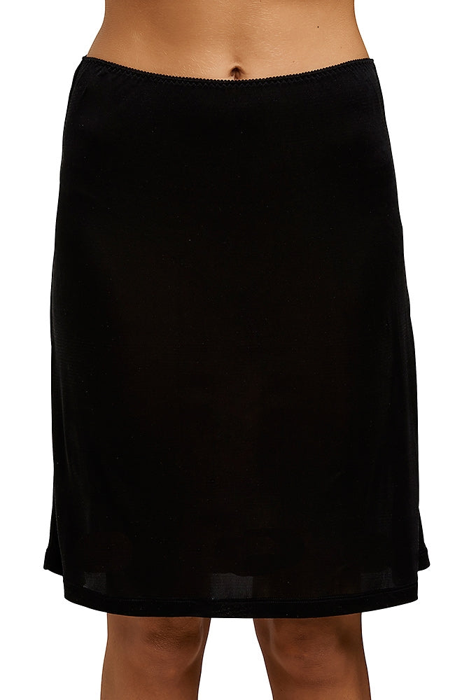 Black silk jersey half slip that sits above the knees and is light and seamless and soft around the waist.