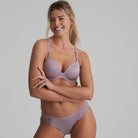 Briefs in a soft sand colour that are decorated with a floral embroidery with matching bra