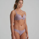 Briefs in a soft sand colour that are decorated with a floral embroidery with matching bra