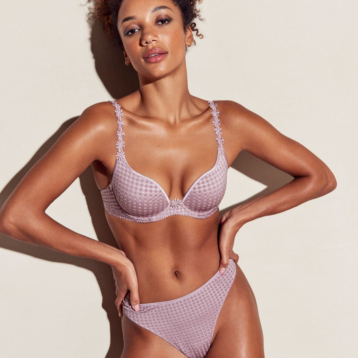 Thong in soft sand colour with little flower at back and shimmer to the fabric and matching bra