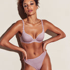 Thong in soft sand colour with little flower at back and shimmer to the fabric and matching bra
