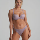 Thong in soft sand colour with little flower at back and shimmer to the fabric and matching bra