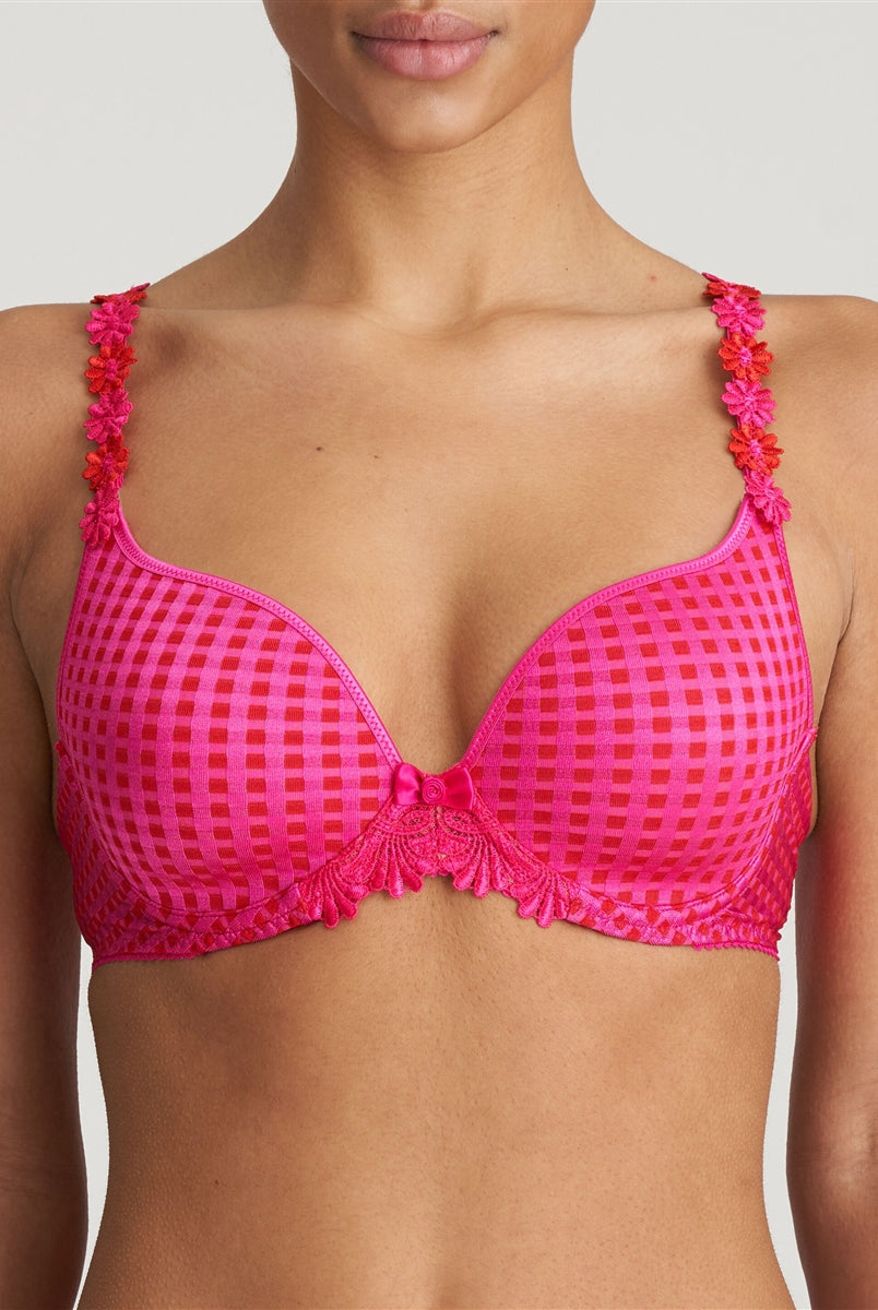 Preformed padded bra with heart-shaped cups in electric pink. The straps can be worn over the shoulders or around the neck and the straight back with silicone band provides extra support.