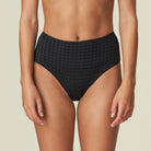 These full black briefs are decorated with an elegant floral embroidery around the waist and legs.