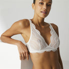 Feminine and fun, the Ivory Karma Soft Cup Triangle Bra has a timeless appeal. The elegant silhouette delivers comfort whilst the lace sits delicately across the skin