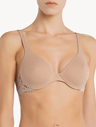 Nude soft cup bra crafted with underwiring, it offers good support and shaping of the bust.