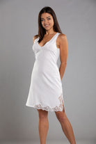 Sleeveless white cotton nightdress complimented with embroidered tulle detail at front and side slit with lace trim.