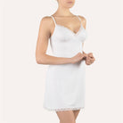 White Italian made slip made from a super soft and smooth microfibre fabric with lace trimming on neck line and bottom of chemise