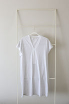 Cotton nightdress with cap sleeves and mid length in a grey chine colour with white contrasts