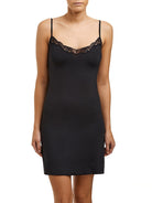 Black microfibre slip that sits above the knee, featuring a v-neck with adjustable straps and trimmed with lace