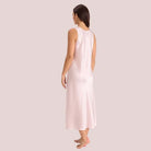 Back view of long silk nightdress in dusk pink with a scoop neck and thick straps cut on the Bias.