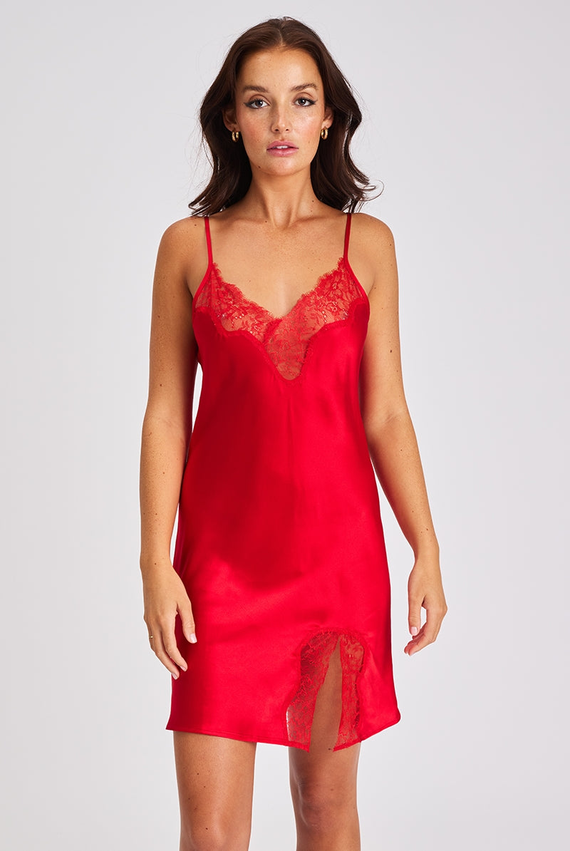 A beautiful red premium quality silk chemise that drapes over the figure gracefully featuring adjustable straps and a flattering v-shaped neckline adorned with beautiful tonal lace.