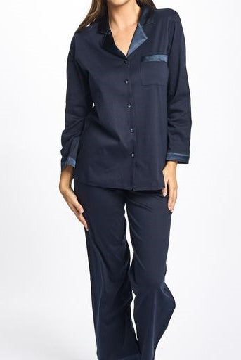 Navy supima cotton pyjama set featuring beautiful silk on the lapel, pocket and cuffs. Button opening runs all the way down the front of the garment for ease of movement and the PJ pant has a comfortable elastic waist band.