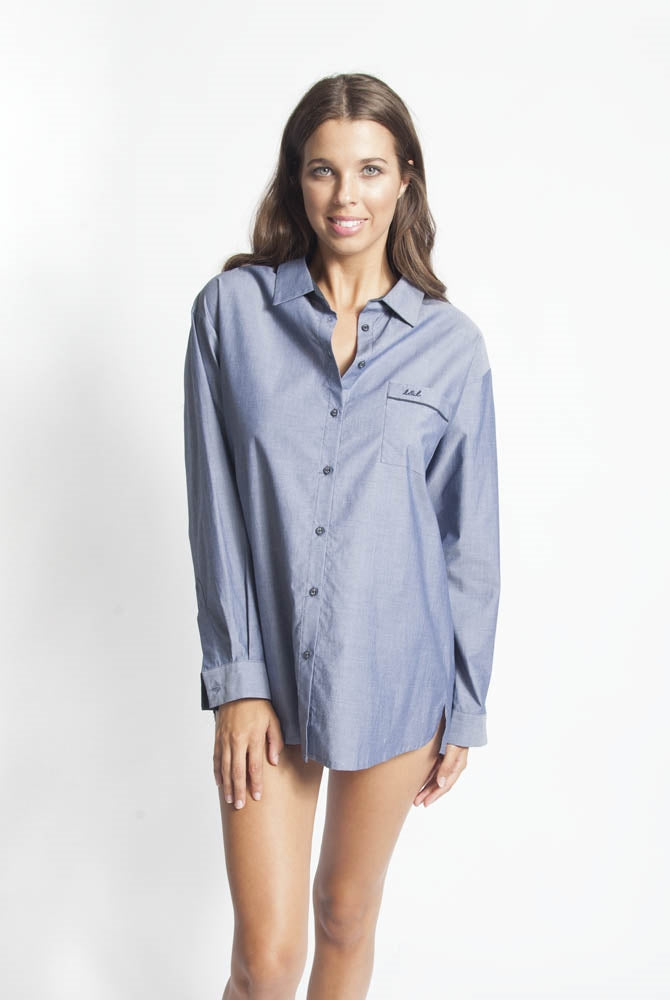 Blue cotton long sleeve PJ Top with button up front, embroidered logo and collar.