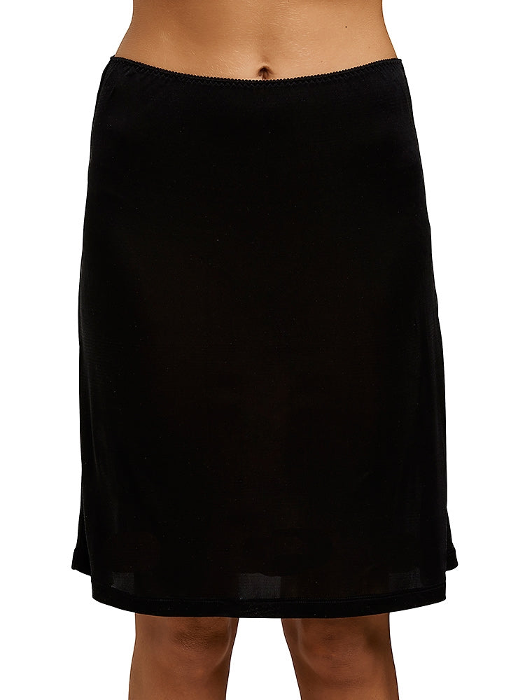 Black silk jersey half slip that sits above the knees and is light and seamless and soft around the waist.