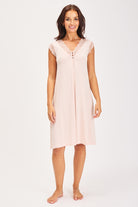 Pale pink modal nightdress featuring lace on the front with button detail. Length sits just below the knee.