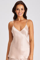 A beautiful pink premium quality silk cami that drapes over the figure gracefully featuring adjustable straps and a flattering v-shaped neckline