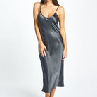 A beautiful premium quality silk chemise in dark grey that drapes over the figure gracefully with fine adjustable straps and a flattering v-shaped neckline. Length is 3/4.