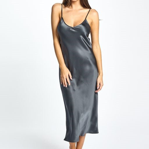 A beautiful premium quality silk chemise in dark grey that drapes over the figure gracefully with fine adjustable straps and a flattering v-shaped neckline. Length is 3/4.