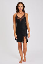 A beautiful black premium quality silk chemise that drapes over the figure gracefully featuring adjustable straps and a flattering v-shaped neckline adorned with beautiful tonal lace.