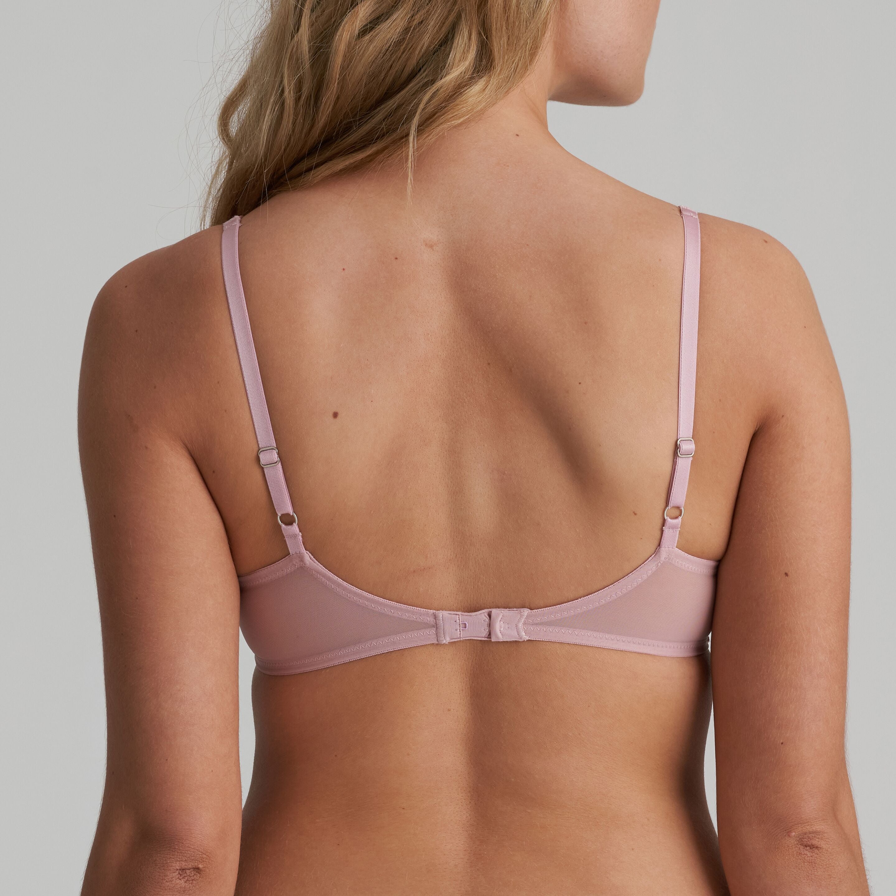 Back view of embroidery and dotted tulle plunge bra in vintage pink