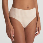 Neutral high-waisted briefs in checkered fabric and finished with a floral detail