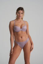 Thong in soft sand colour with little flower at back and shimmer to the fabric and matching bra