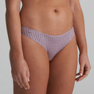 Briefs in a soft sand colour that are decorated with a floral embroidery