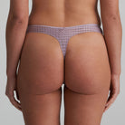 Thong in soft sand colour with little flower at back and shimmer to the fabric