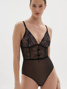 Made from sheer tulle and subtle two-tone embroidery on lace, the Scenario lingerie bodysuit is bursting with exquisite details.