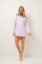 In a summery colour combination of lilac gingham crafted from Wanderluxe's custom-made fabrics, contrasted with mint piping and lilac mother of pearl buttons, wake up feeling effortlessly chic in this beautiful long sleeve nightshirt.